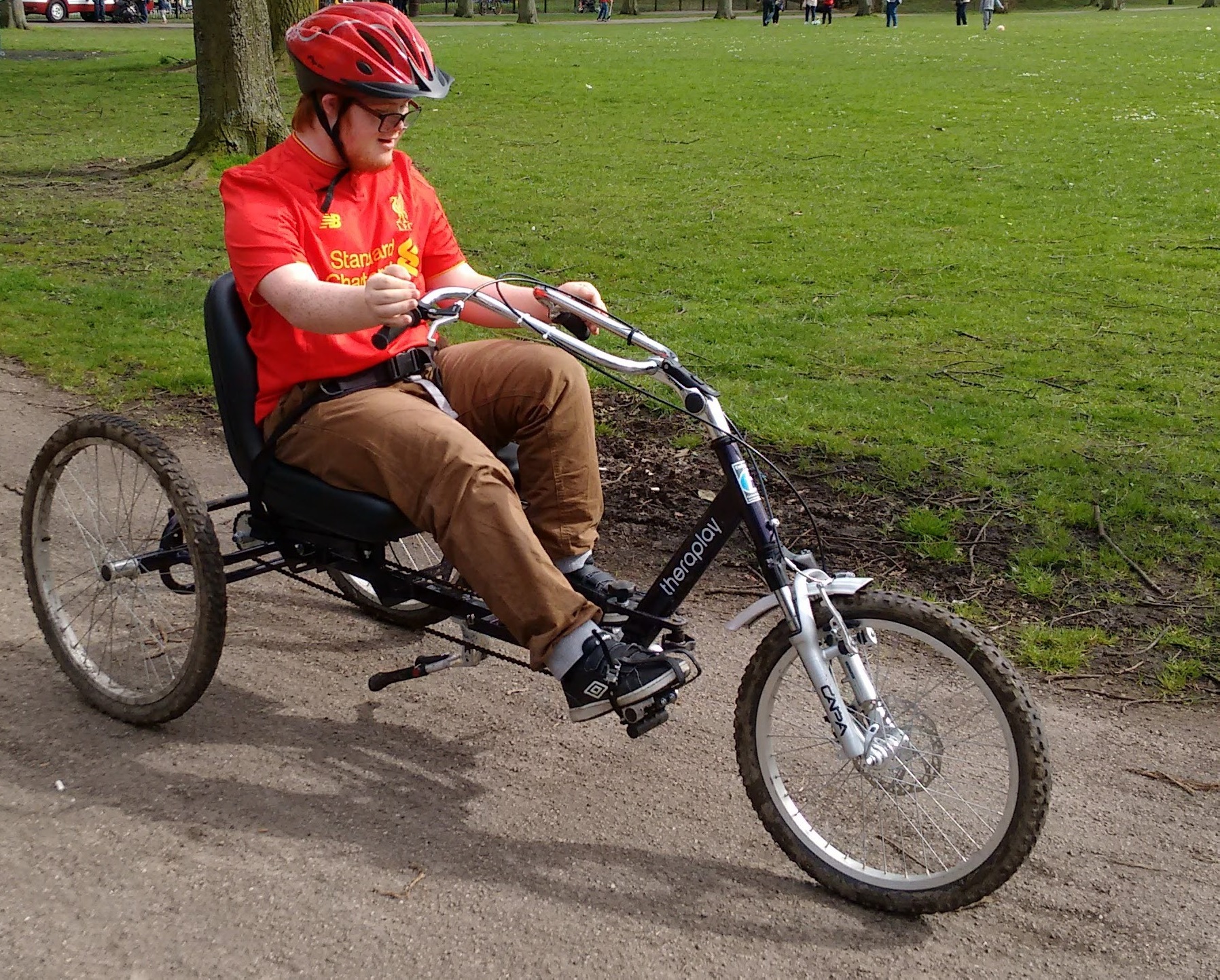Man on adapted bike for disabled people or people recovering from injury