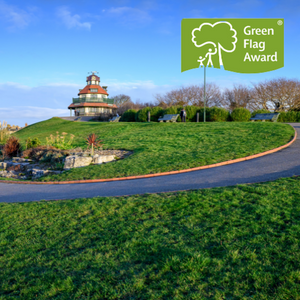 A bright image showing the Mount Pavilion and Gardens with the Green Flag Award Logo