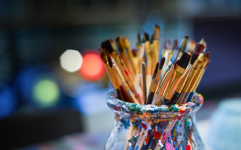 Jar of paintbrushes.