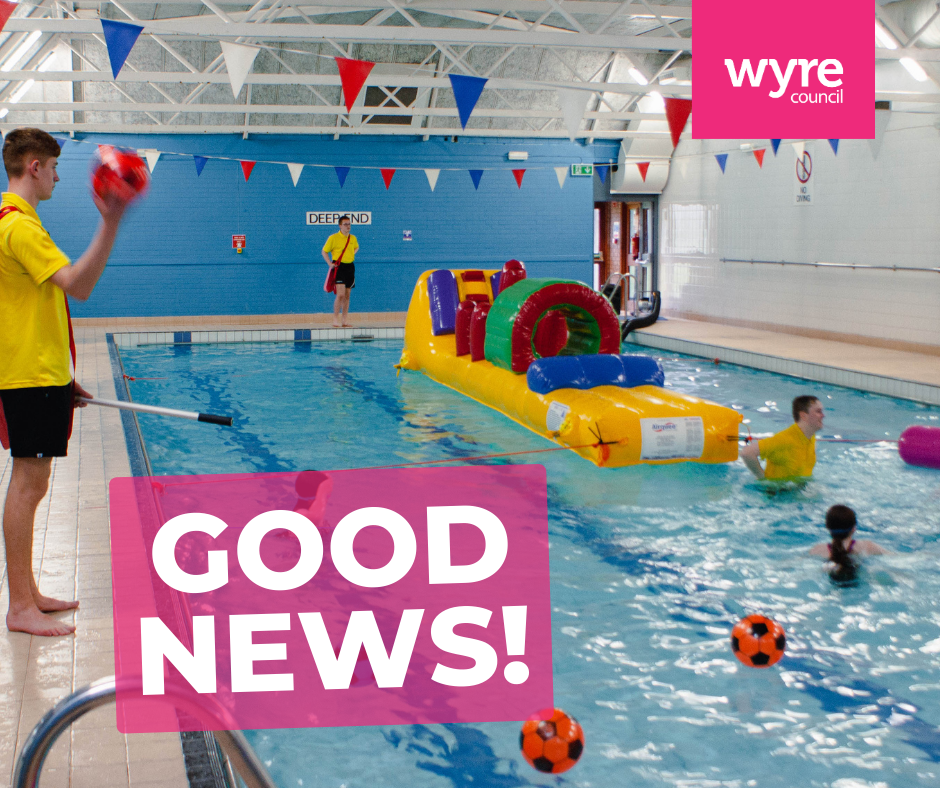 an image of a pool with inflatable and swimmers and lifeguard