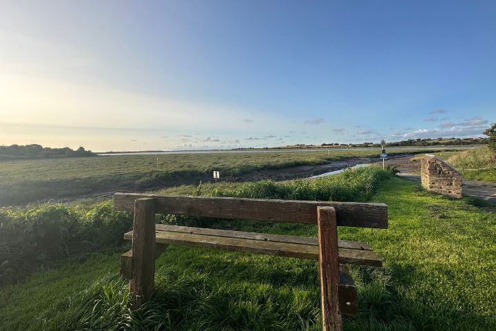 A majestic view of Wyre Estuary Park showing lush green fields.