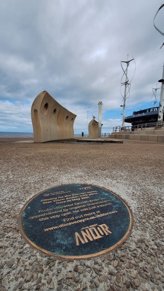 A metal plaque in the floor along the Cleveleys promenade to recognise a filming location for Star Wars: Andor.