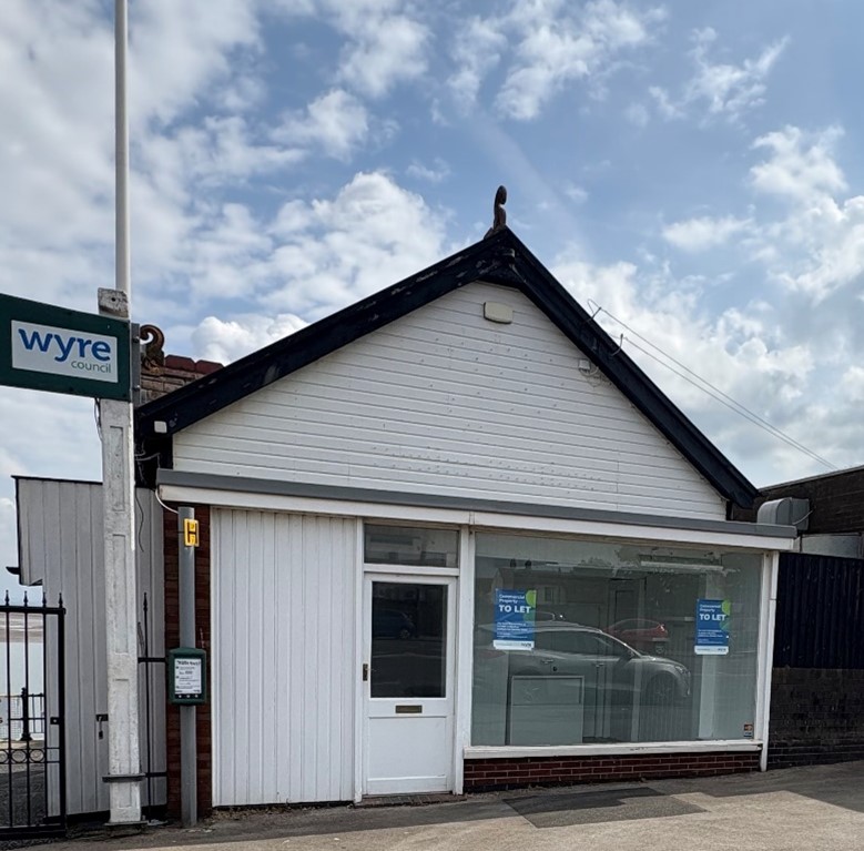 A white hut, used as a retail space on Fleetwood Esplanade.