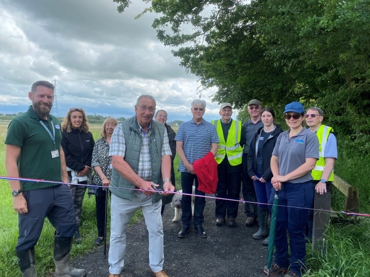 A crowd of people gathering to celebrate the phase one completion of the gateway to wyre estuary project.