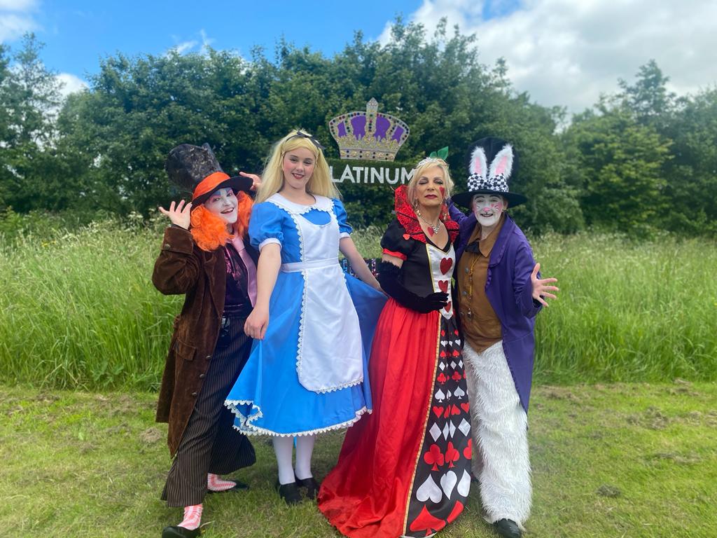 Giant jubilee picnic 4 june 2022 alice in wonderland cast close up
