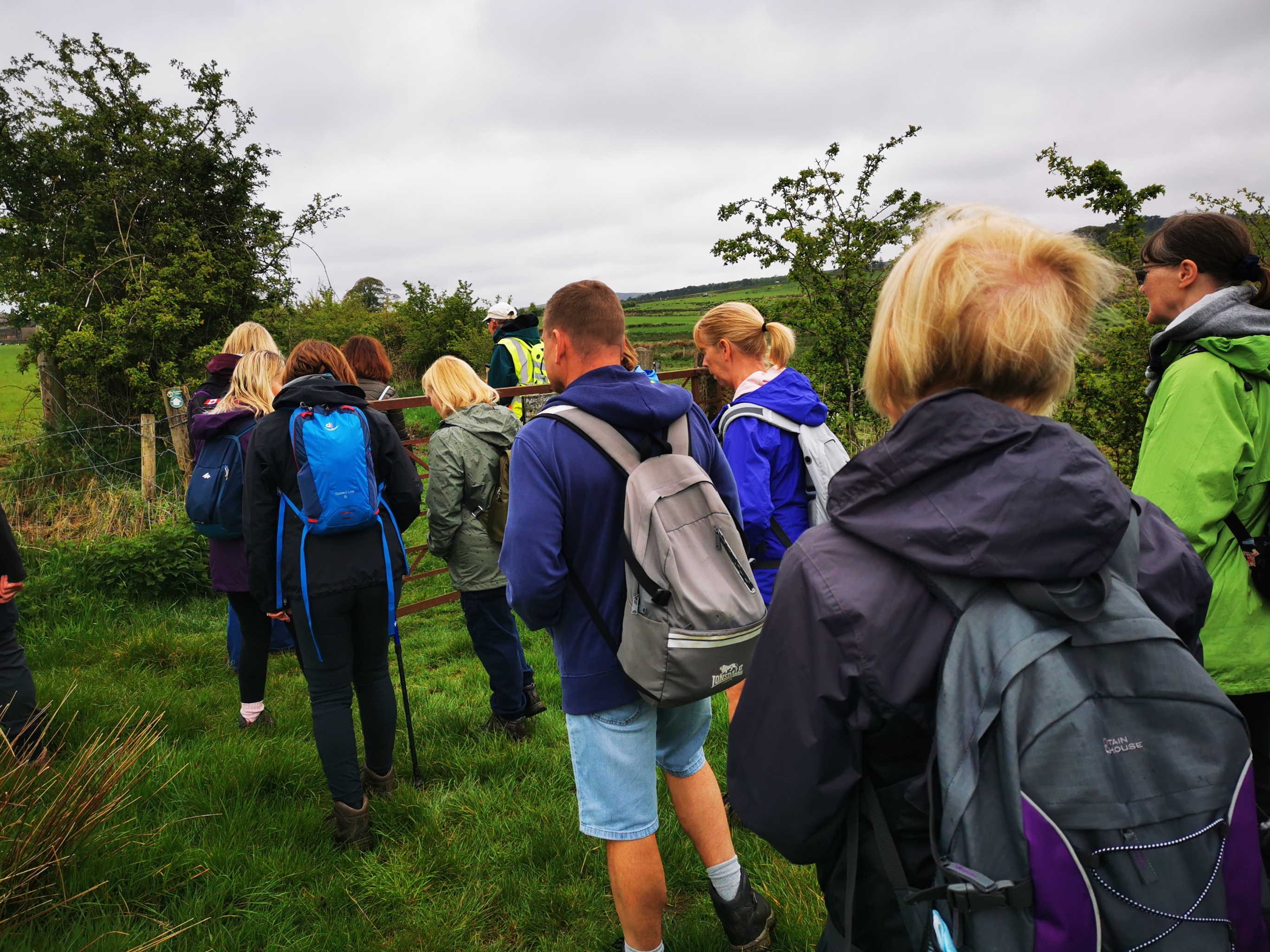 People walking through countryside