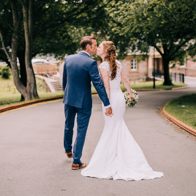 Married couple kissing at Mount Pavilion Fleetwood