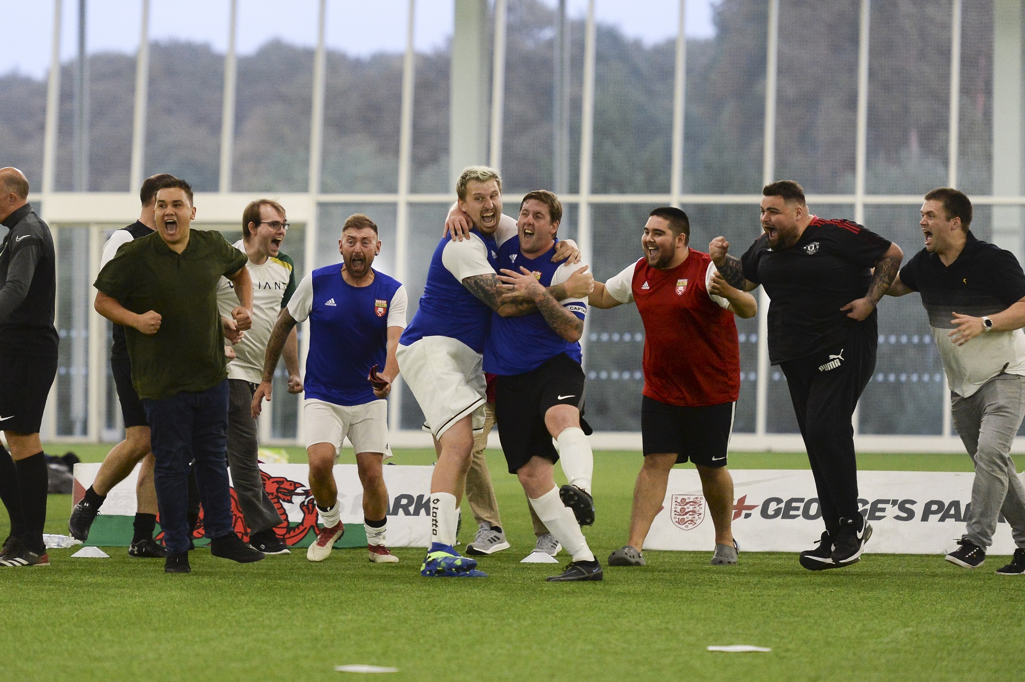 group of men playing football