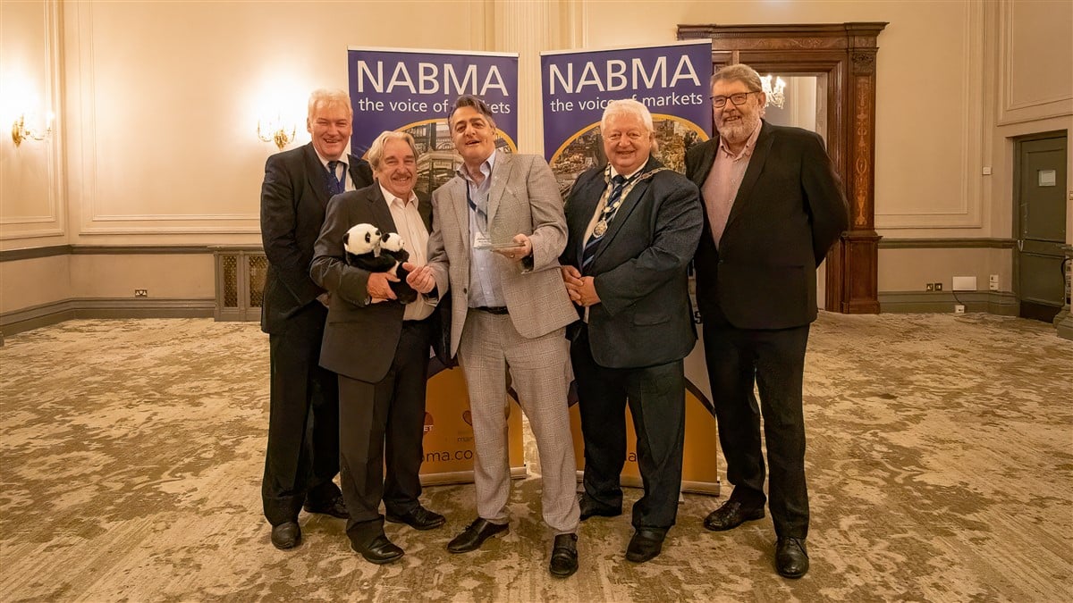 Market Manager with his award