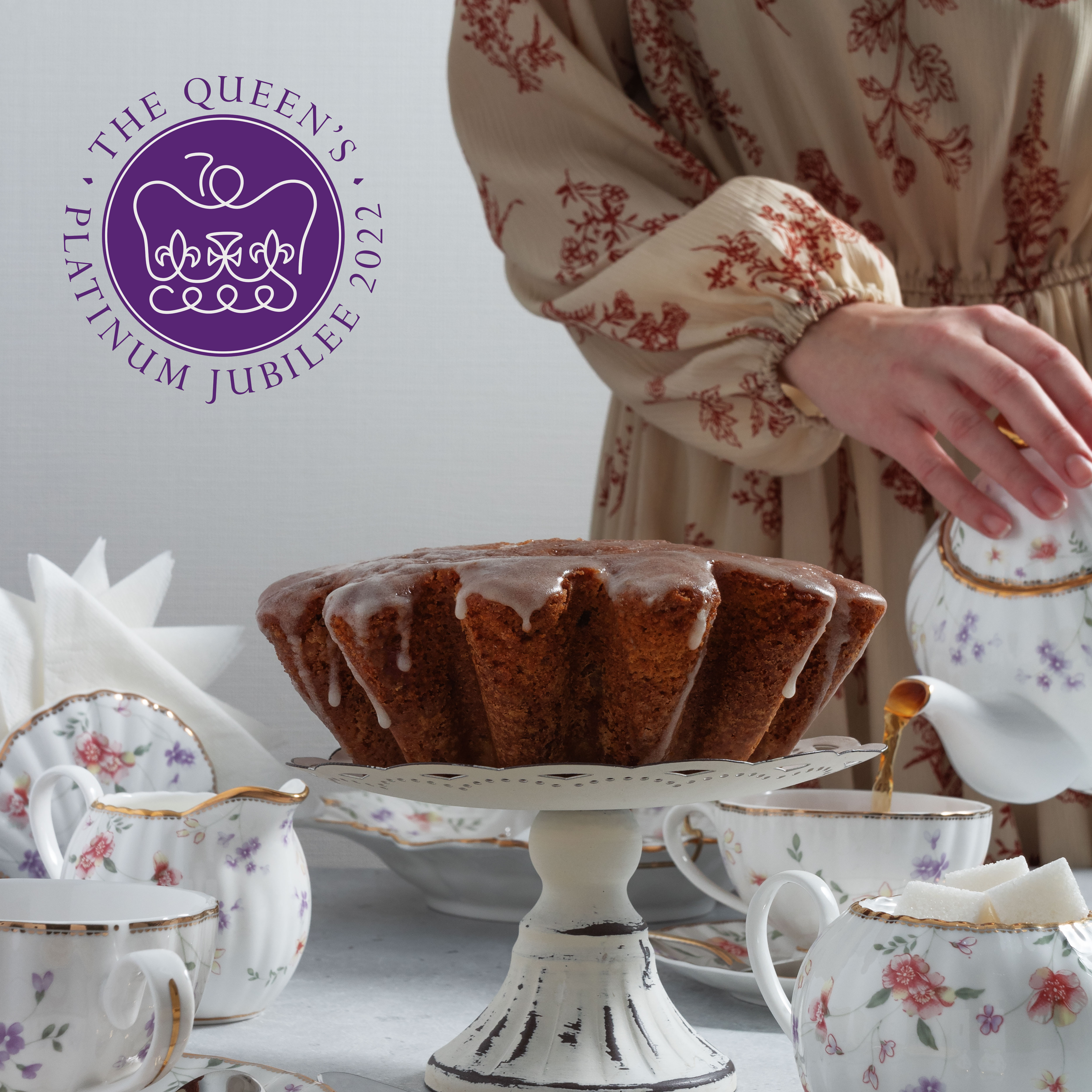 Cake and tea being served