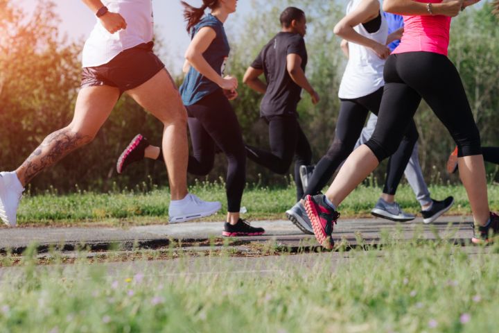 Close up of a group of runners legs mid-action