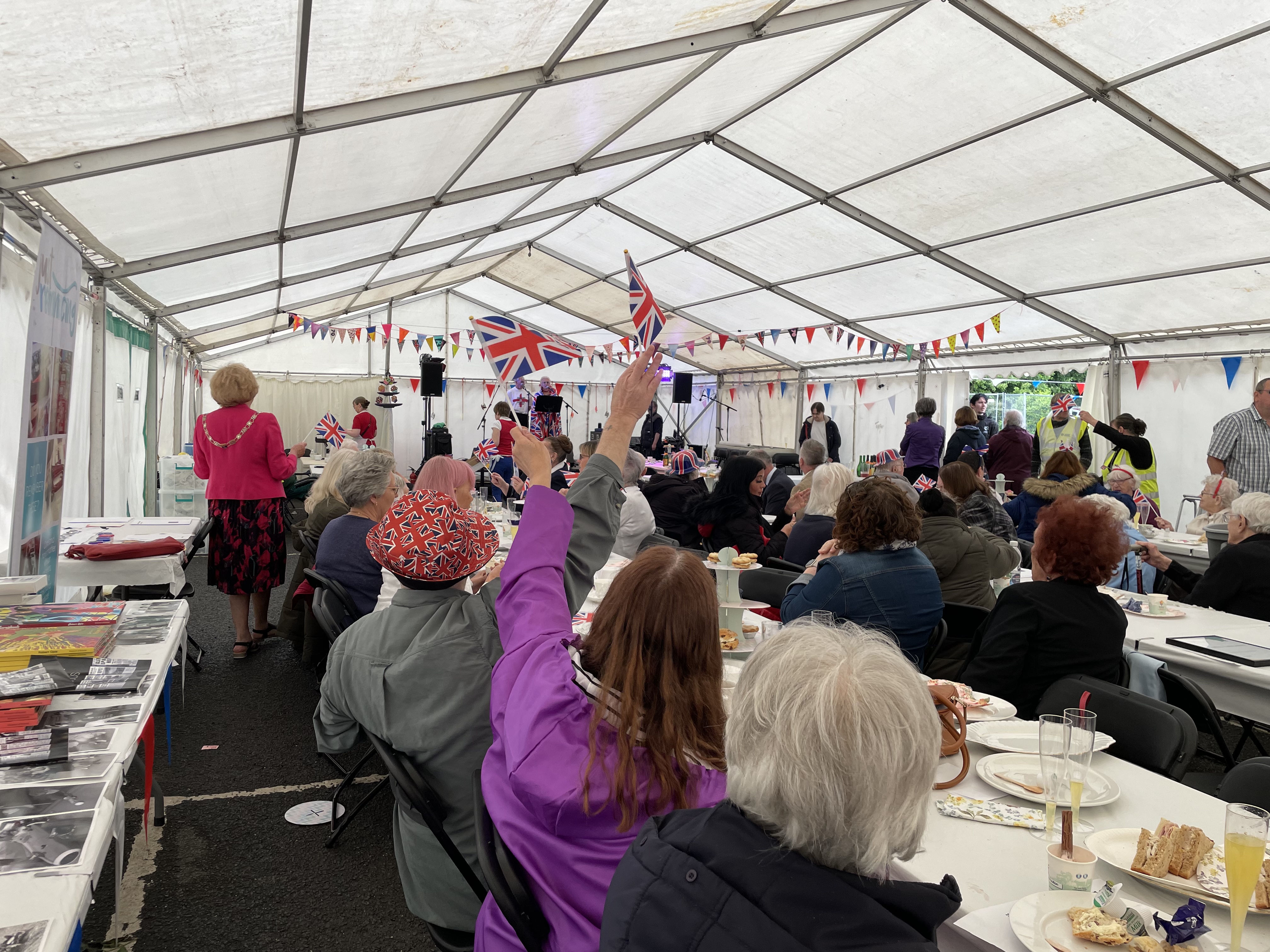 Terrific tea party civic centre guests waving flag