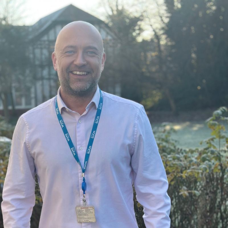 Employee Radford smiling and standing outside Wyre Council&#039;s Civic Centre.