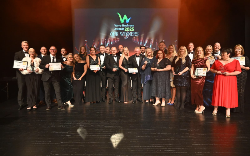 Group of winners on stage from 2025 Wyre Business Awards