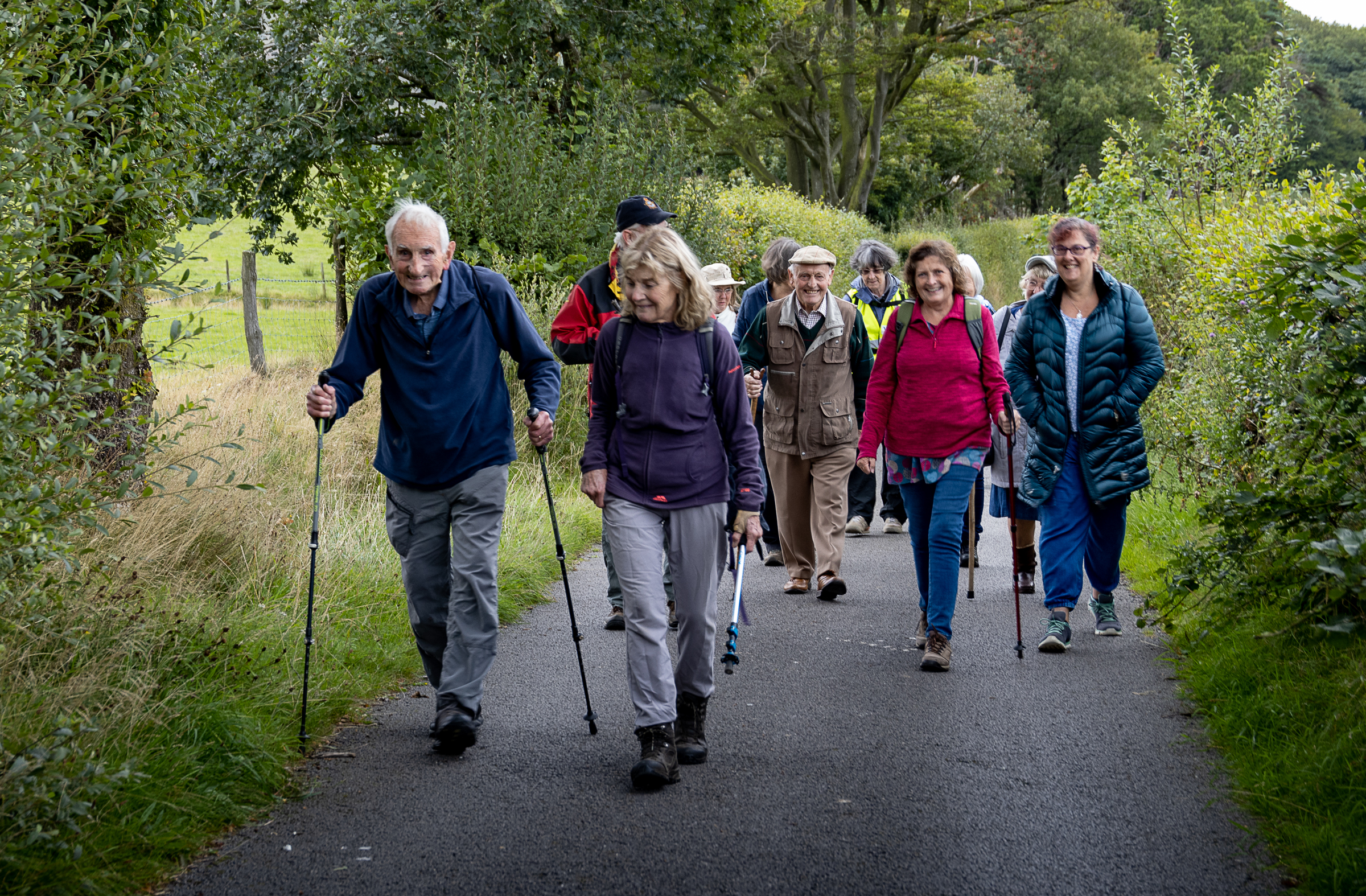 People walking uphill