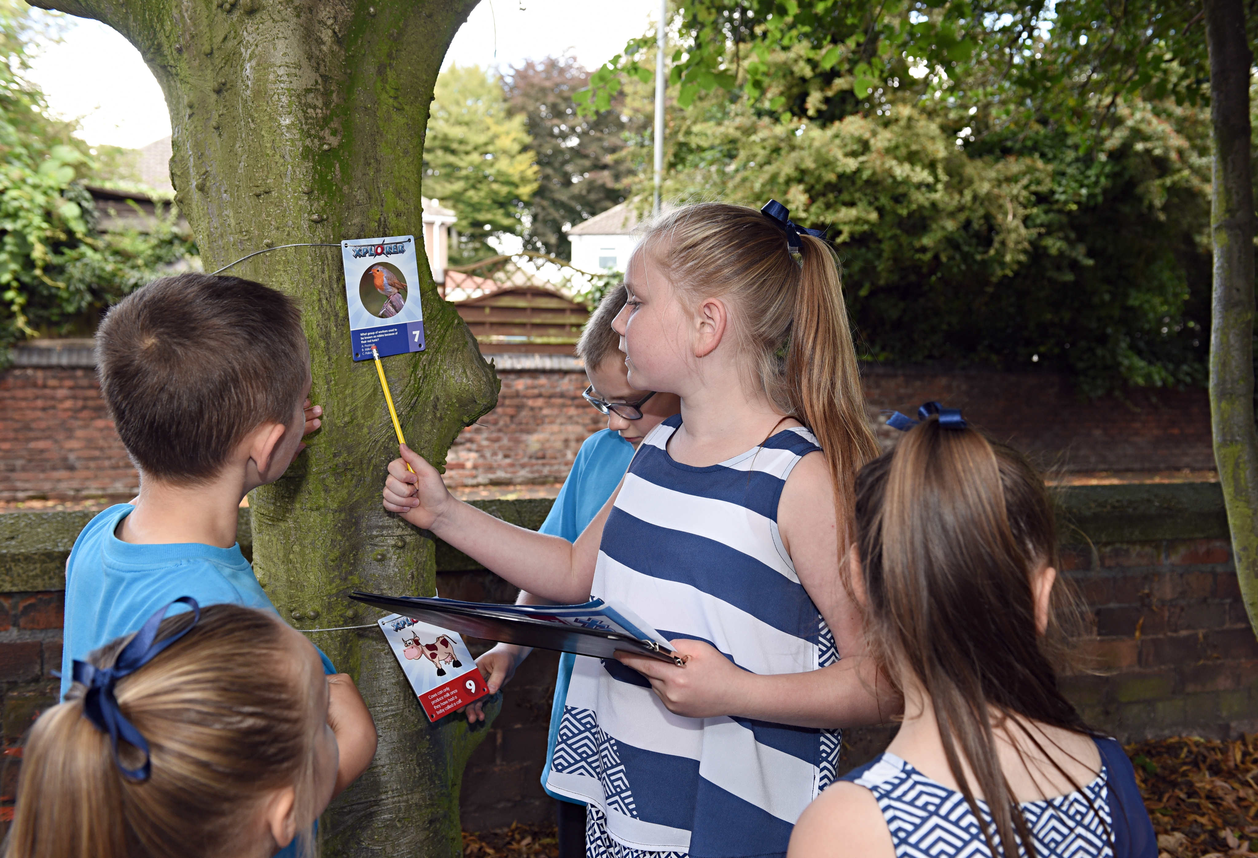 Xplorer activity - children enjoying a navigation/orienteering challenge