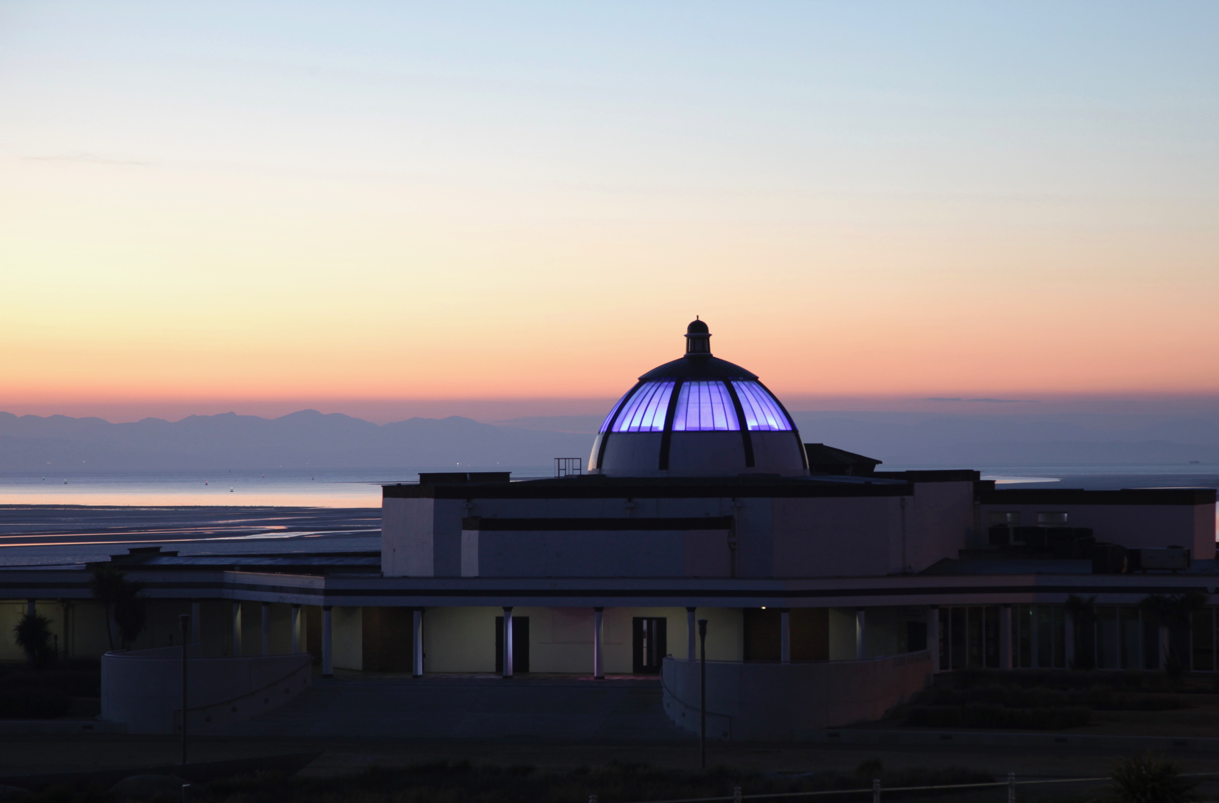 Marine hall dome lit up blue