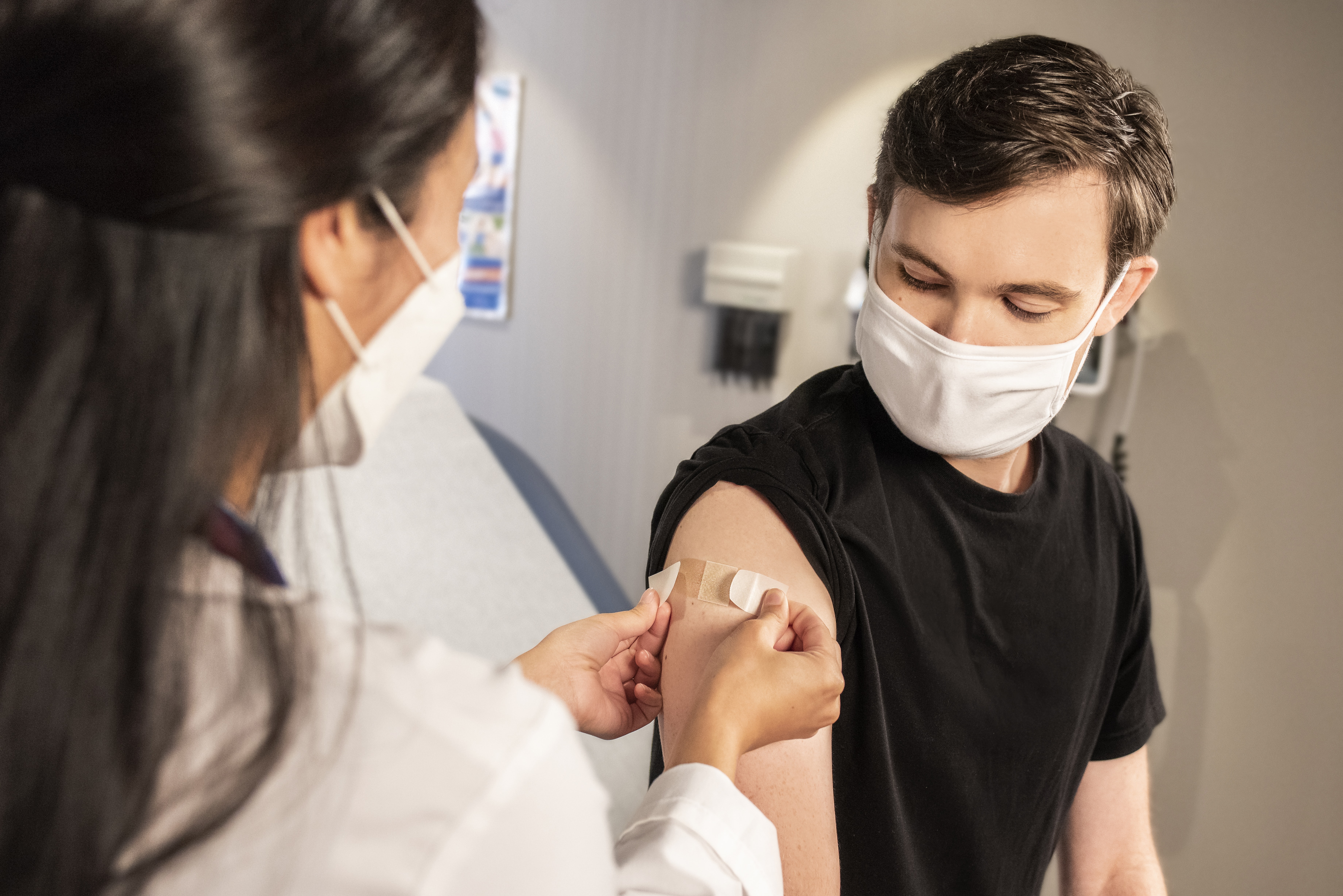 Man having his covid vaccine