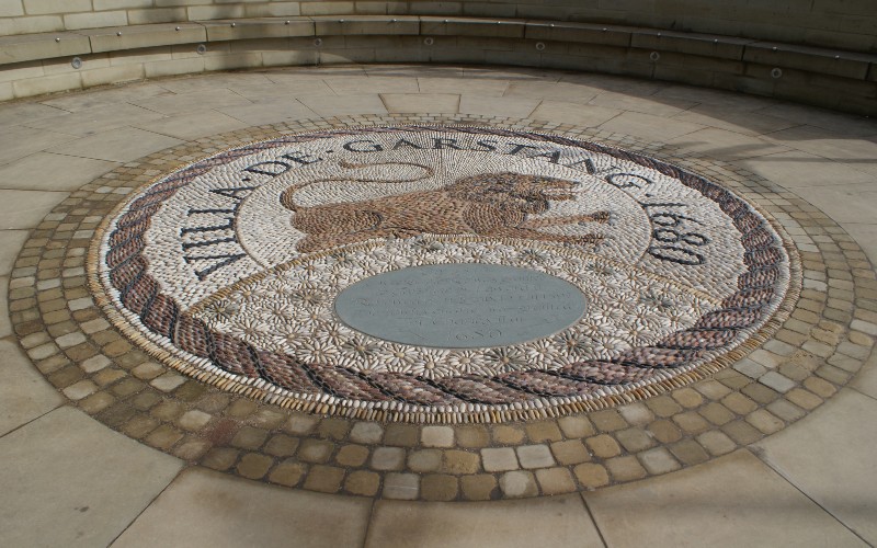 Crest featuring lion, designed in stone in Garstang's Cerestanc Square.